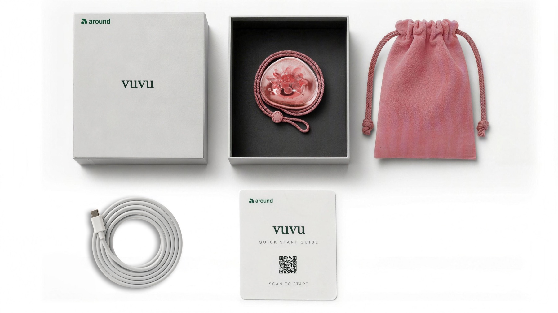 What's in the box, laid out: gift box, Blush Bloom vuvu with its lanyard, pink drawstring pouch, USB-C cable and quick-start card